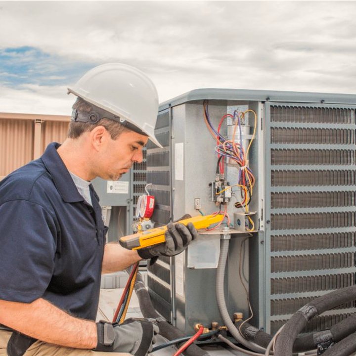 Walkerton Heating & Cooling HVAC technician on a service call in Walkerton, Ontario